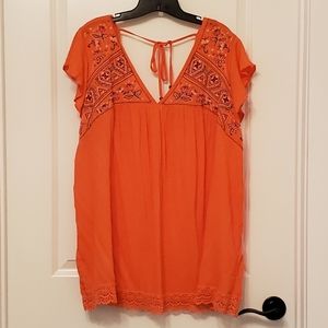 Coral embroidered short sleeve shirt.